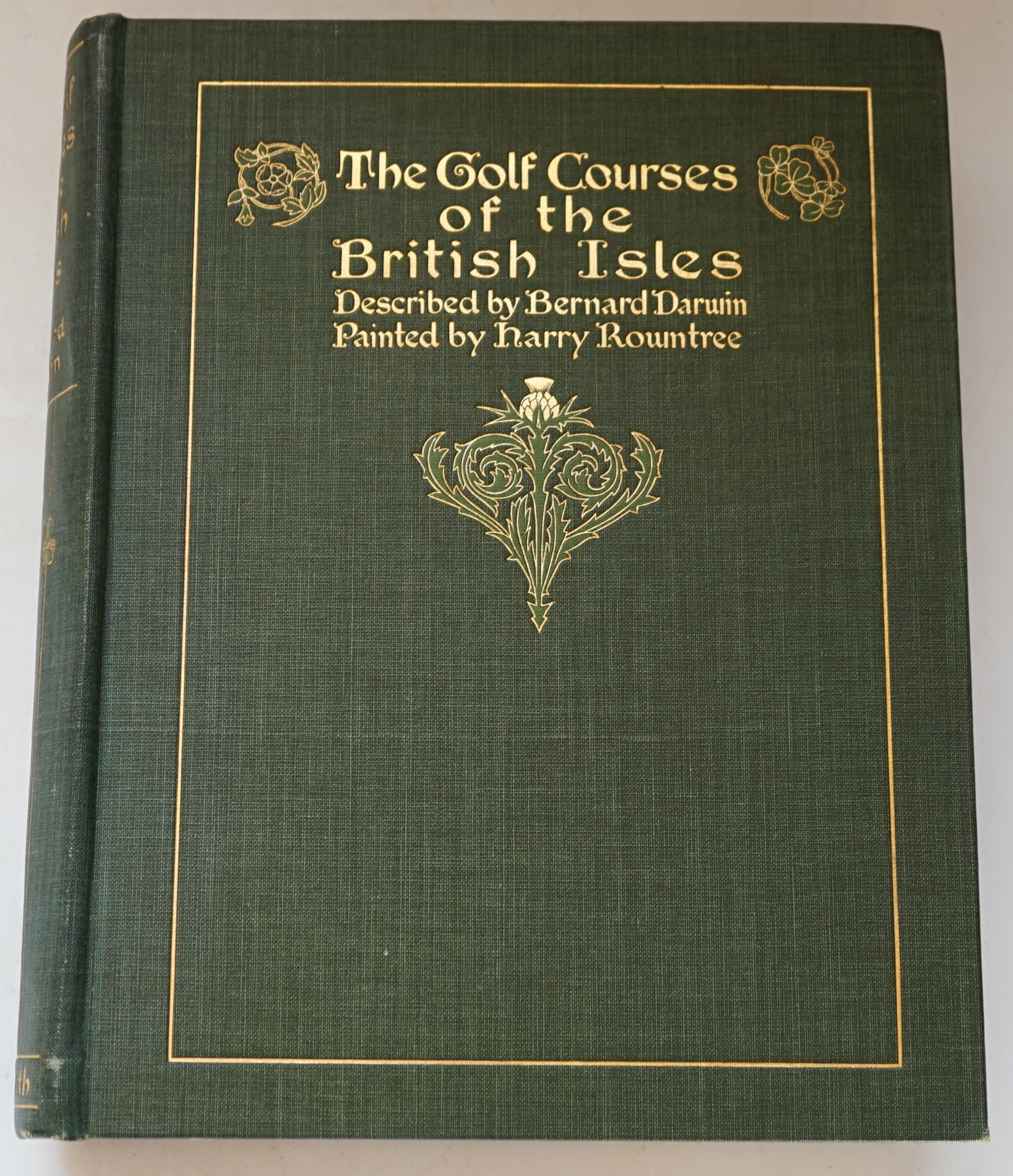 Darwin, Bernard - The Golf Courses of the British Isles, 1st edition, illustrated by Harry Rountree, with colour frontispiece and 44 colour plates, 4to, publisher's green pictorial cloth, some spotting, Duckworth, London
